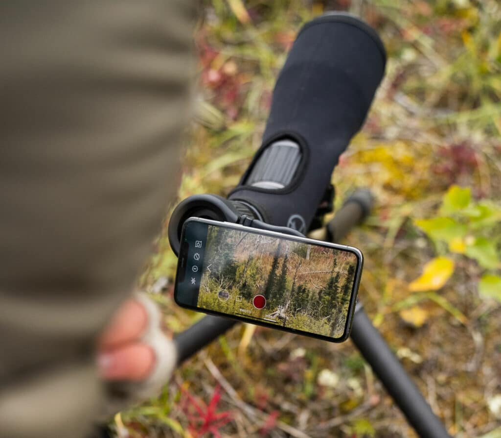 spotting scope on tripod with Magview phone adaptor.
