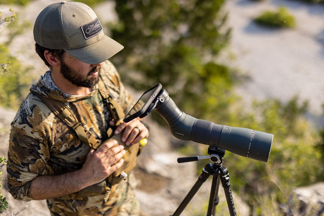A hunter digiscoping game animals.