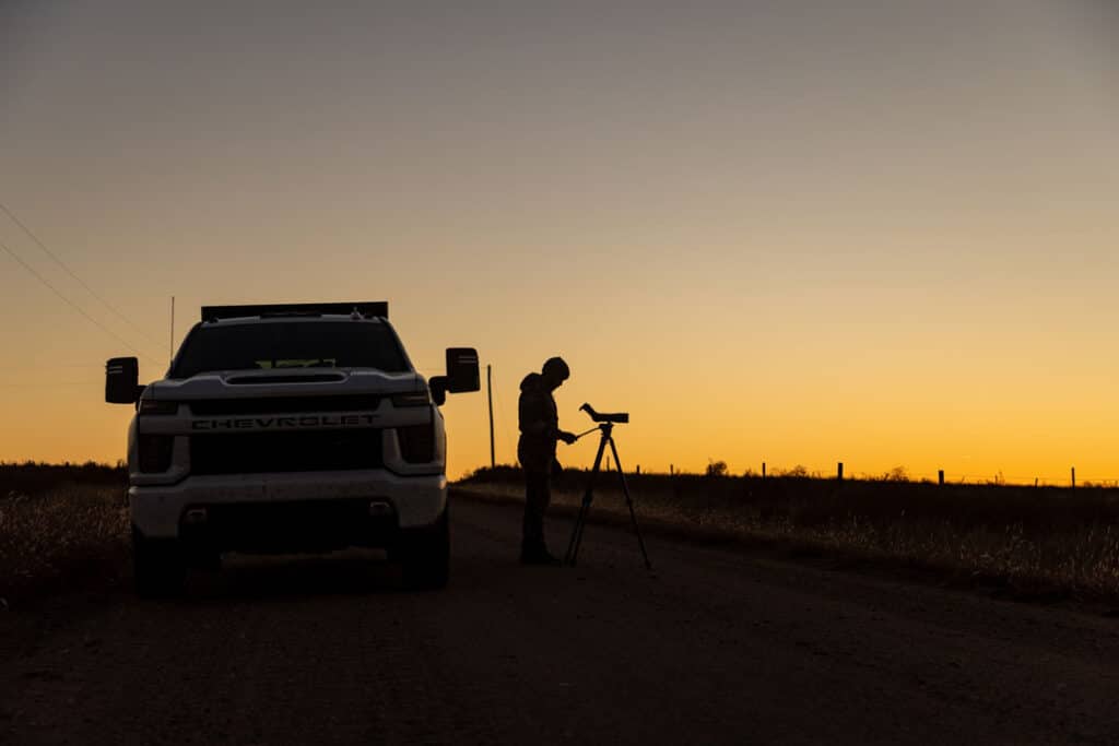 Person using a Magview while digiscoping at dusk.