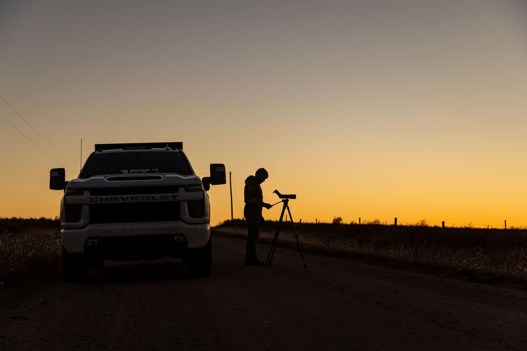 Person using a Magview while digiscoping at dusk.